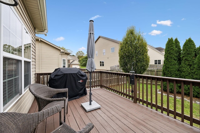 deck featuring fence and grilling area