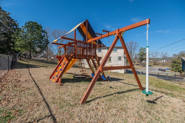 view of play area with a yard and fence