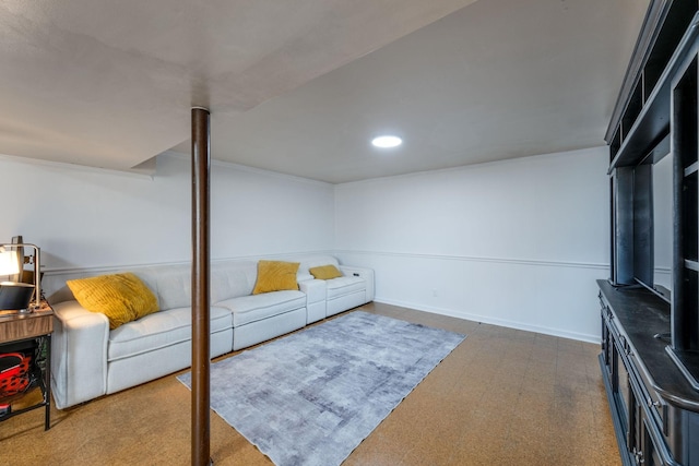 living room featuring recessed lighting and baseboards