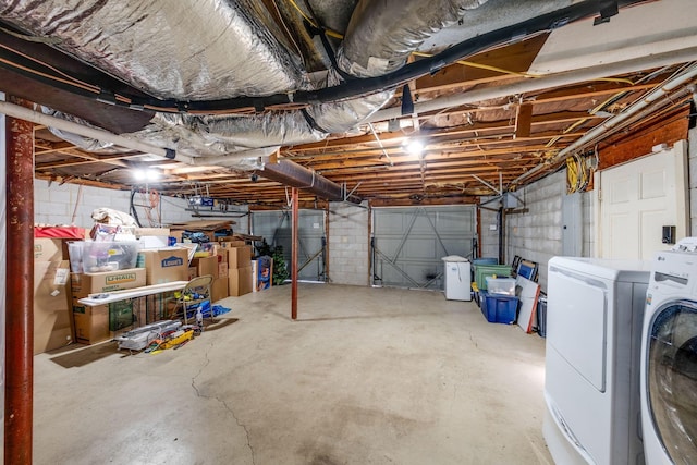 unfinished basement with independent washer and dryer