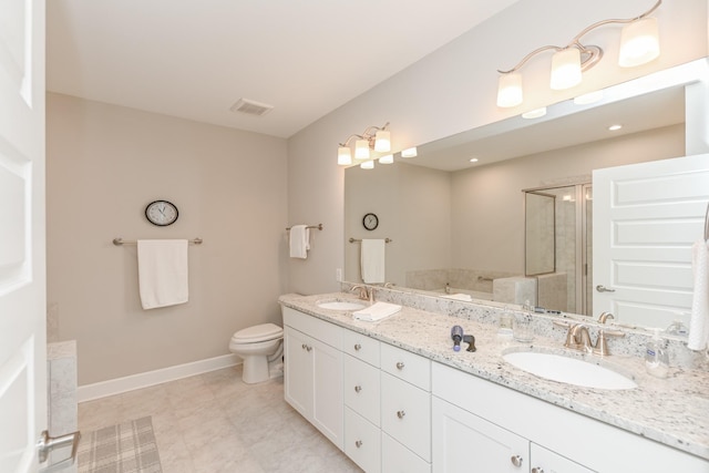 full bathroom with double vanity, a stall shower, visible vents, and a sink