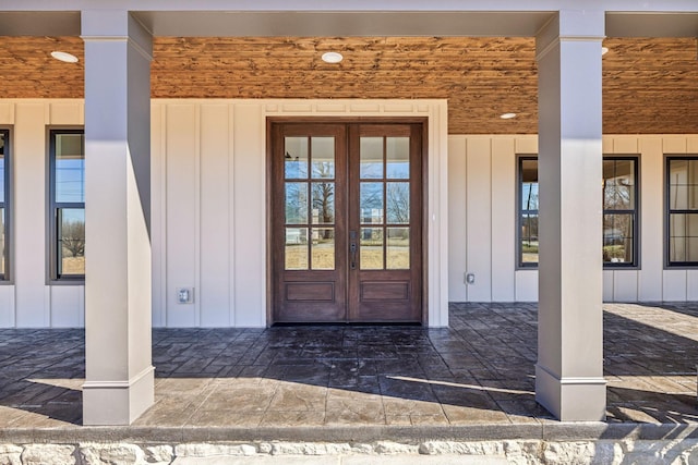 998 Iron Hill Rd, Burns, TN 37029 - entrance to property featuring french doors and board and batten siding