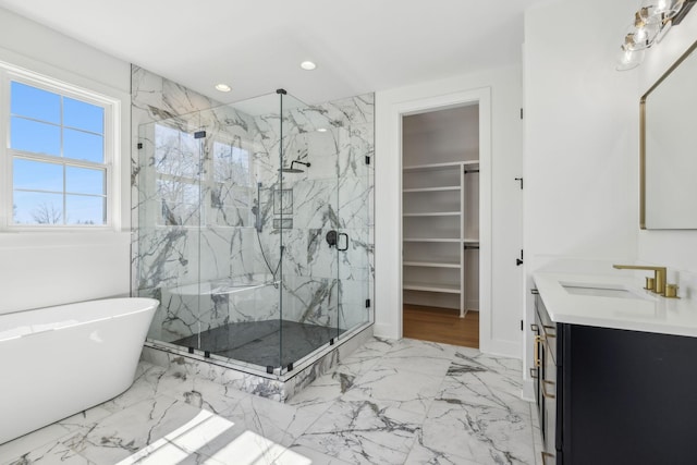 998 Iron Hill Rd, Burns, TN 37029 - bathroom with a walk in closet, marble finish floor, a marble finish shower, recessed lighting, and vanity