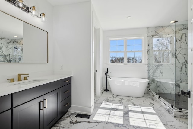 998 Iron Hill Rd, Burns, TN 37029 - bathroom with a freestanding tub, vanity, baseboards, marble finish floor, and a marble finish shower