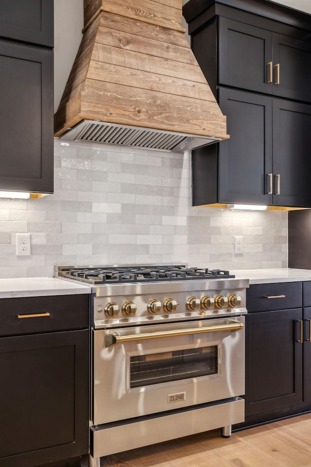998 Iron Hill Rd, Burns, TN 37029 - kitchen featuring light countertops, decorative backsplash, high end range, and custom range hood