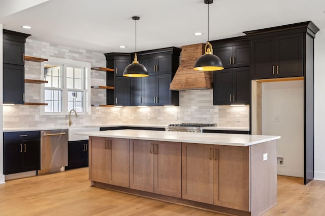 998 Iron Hill Rd, Burns, TN 37029 - kitchen with light countertops, stainless steel dishwasher, premium range hood, open shelves, and a sink