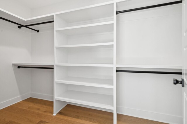 998 Iron Hill Rd, Burns, TN 37029 - spacious closet with wood finished floors
