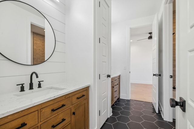 998 Iron Hill Rd, Burns, TN 37029 - bathroom featuring tile patterned flooring, a ceiling fan, and vanity