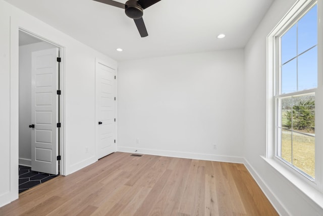 998 Iron Hill Rd, Burns, TN 37029 - unfurnished room with recessed lighting, light wood-type flooring, a ceiling fan, and baseboards