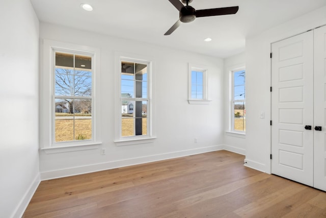 998 Iron Hill Rd, Burns, TN 37029 - foyer entrance featuring light wood-type flooring, plenty of natural light, and baseboards
