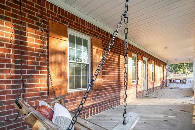 wooden deck featuring covered porch