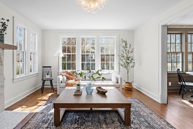 interior space with an inviting chandelier and plenty of natural light