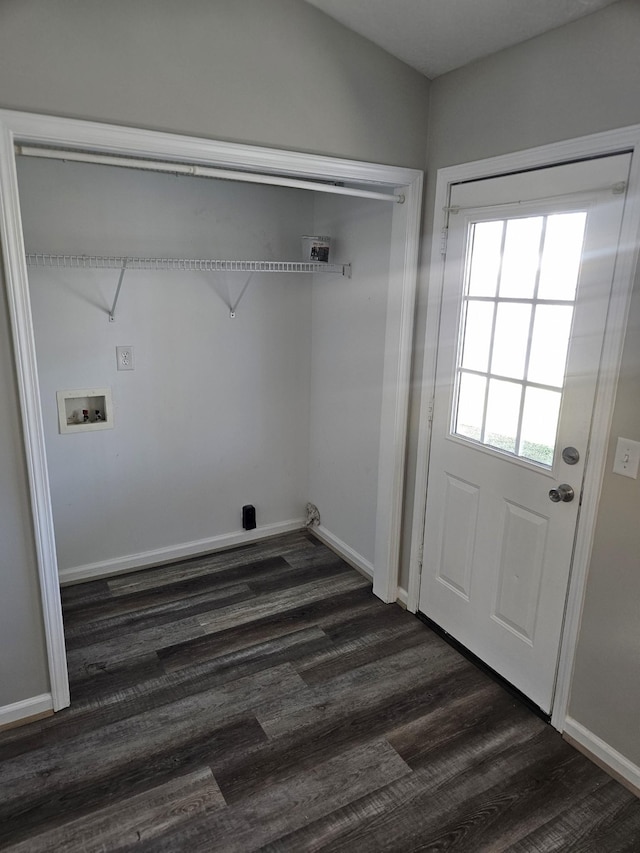 washroom featuring hookup for a washing machine, dark wood finished floors, and baseboards