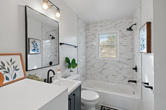 full bathroom with tub / shower combination, vanity, and toilet