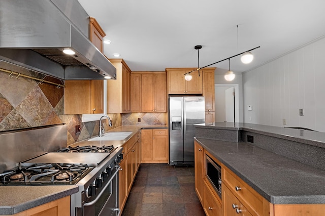 kitchen featuring tasteful backsplash, stone tile floors, extractor fan, stainless steel appliances, and a sink