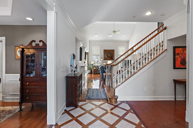 entrance foyer featuring stairs, recessed lighting, baseboards, and wood finished floors