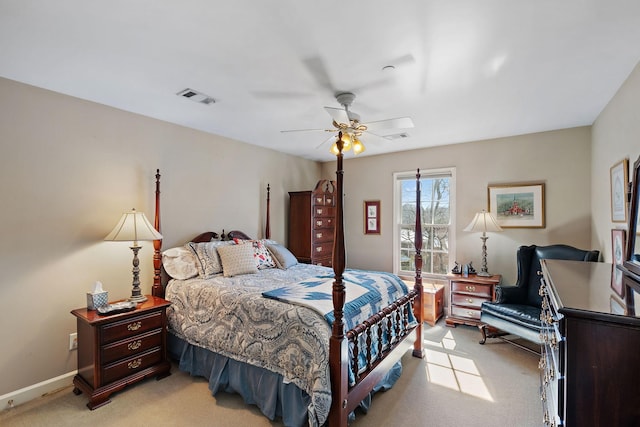 bedroom with light colored carpet, visible vents, ceiling fan, and baseboards