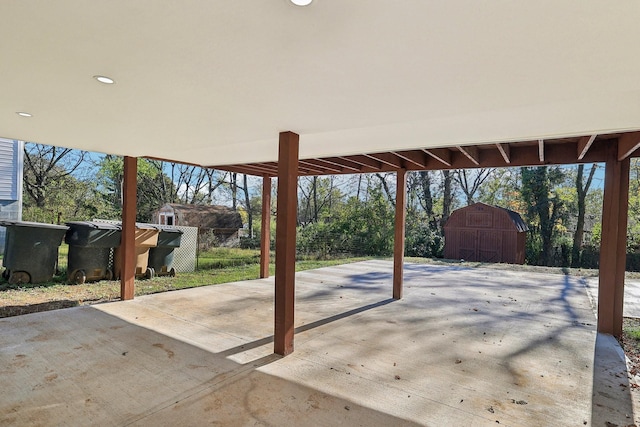 view of patio / terrace featuring a barn and an outdoor structure