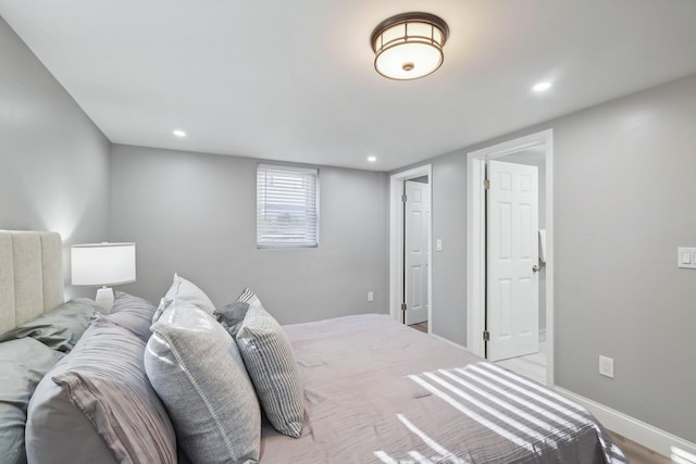 bedroom with baseboards and recessed lighting