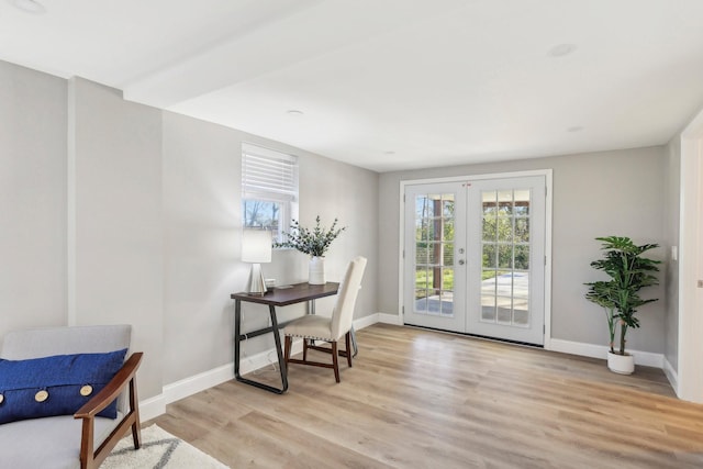 office featuring french doors, light wood-style flooring, and baseboards