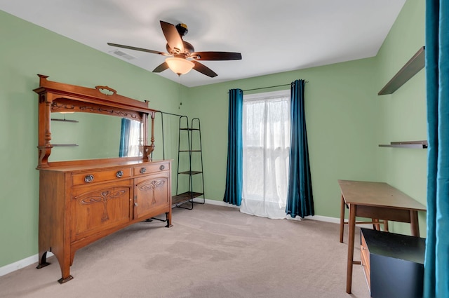 interior space with light carpet, visible vents, and baseboards