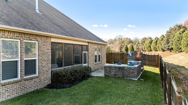 view of yard featuring a patio area and a fenced backyard