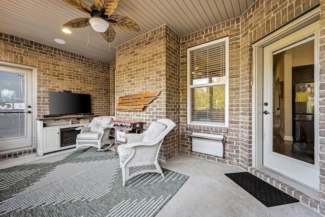 view of patio / terrace with a ceiling fan and area for grilling