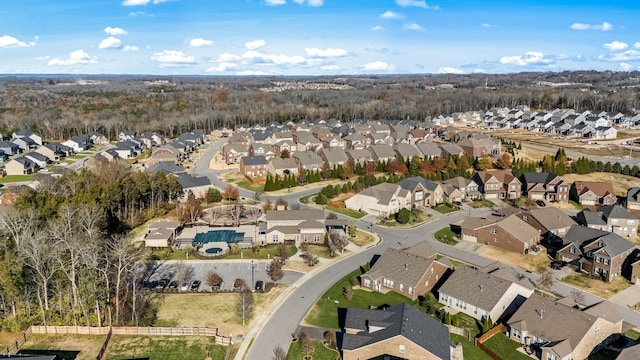 birds eye view of property with a residential view