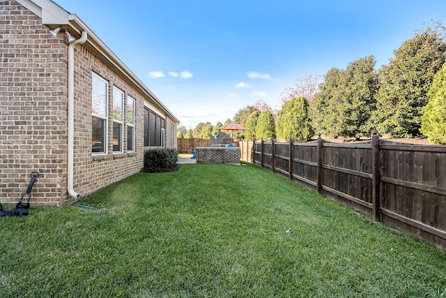 view of yard featuring a fenced backyard