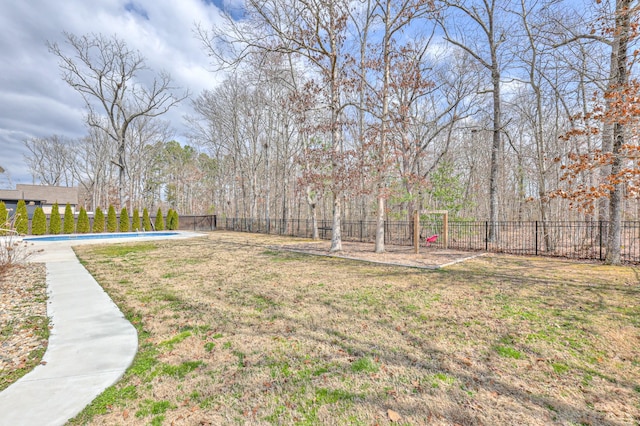 view of yard featuring a fenced backyard and a fenced in pool