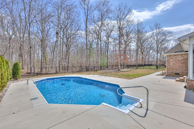 view of swimming pool featuring a patio area, a fenced in pool, and a fenced backyard