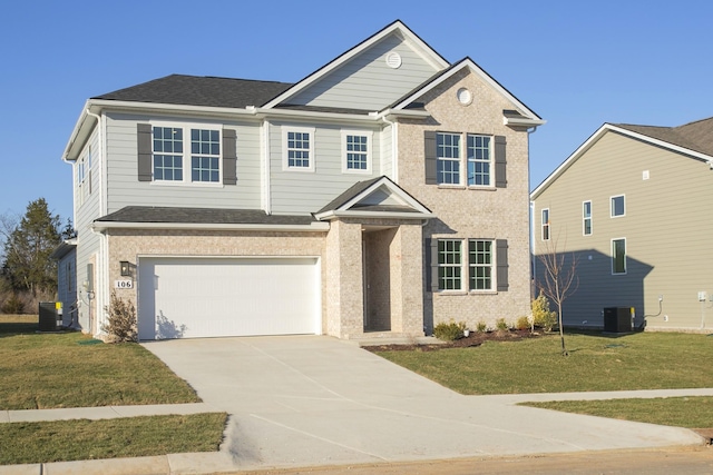 view of front facade with brick siding, an attached garage, cooling unit, driveway, and a front lawn