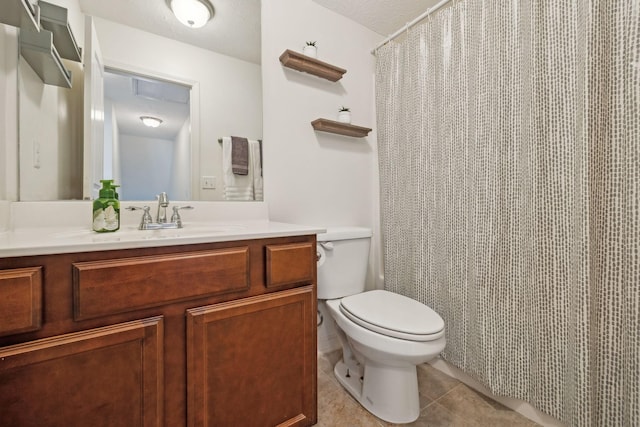 full bathroom featuring a shower with shower curtain, vanity, toilet, and tile patterned floors