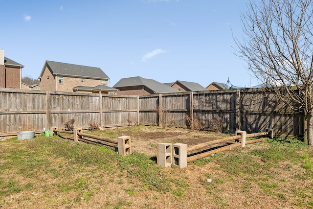 view of yard featuring a fenced backyard