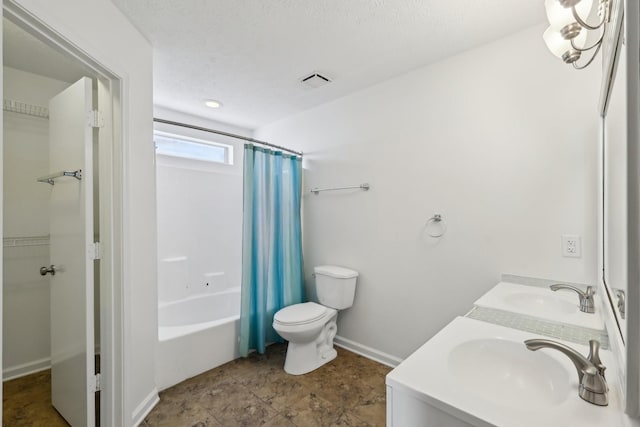 full bath with visible vents, a sink, toilet, and shower / bath combo with shower curtain