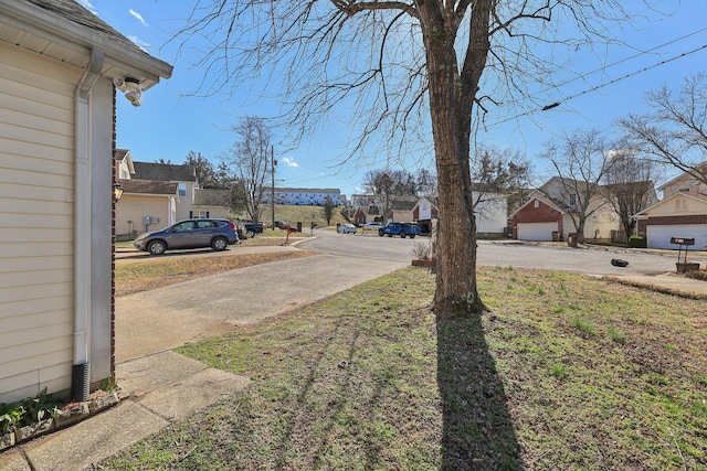 view of yard featuring a residential view