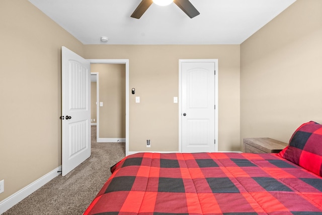 bedroom with a ceiling fan, carpet, and baseboards