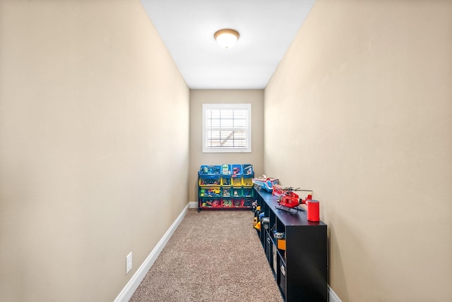 game room featuring carpet floors and baseboards