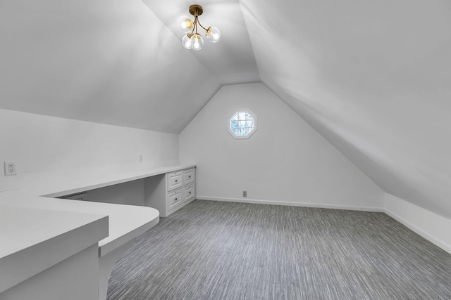 bonus room with carpet flooring, vaulted ceiling, and baseboards