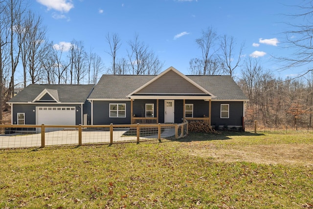 view of front of property featuring an attached garage, a porch, a front yard, and fence