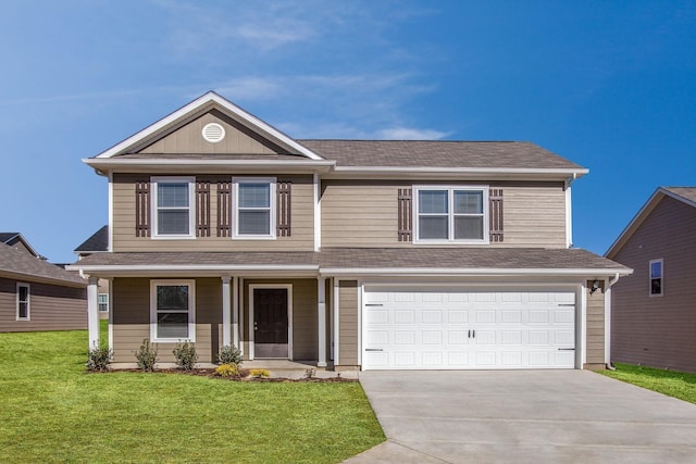 traditional home featuring a garage, concrete driveway, a front lawn, and a shingled roof