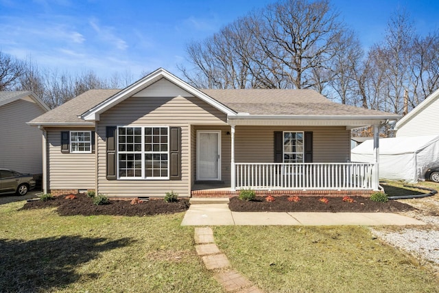 view of front of house featuring crawl space, covered porch, a front lawn, and roof with shingles