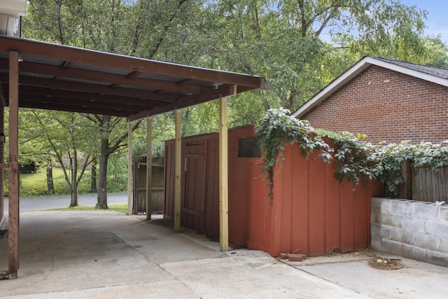 exterior space with a carport