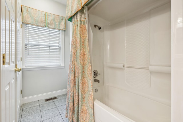 bathroom with shower / bathtub combination with curtain, tile patterned flooring, visible vents, and baseboards