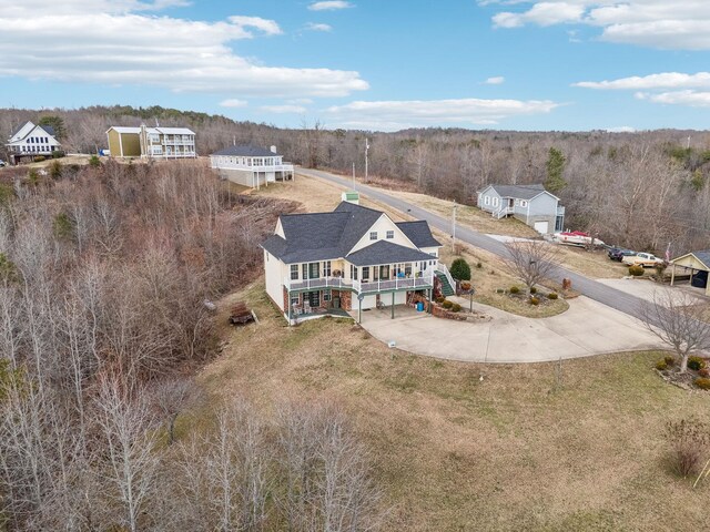 aerial view with a wooded view