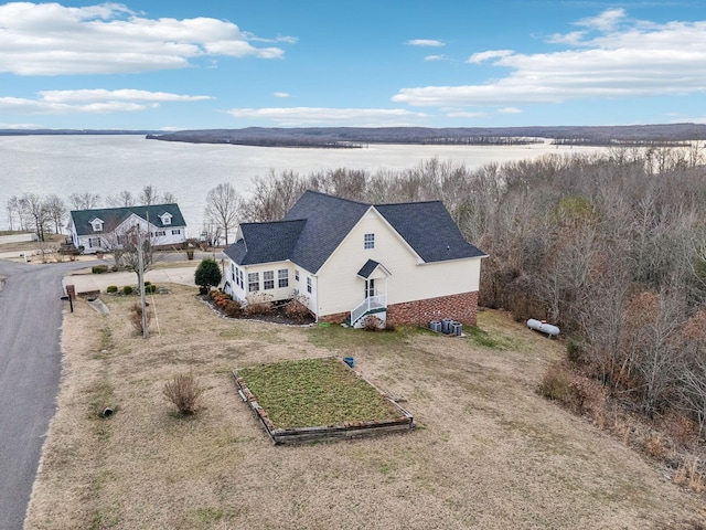 drone / aerial view with a water view