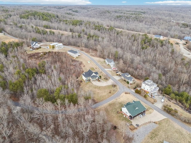 bird's eye view with a forest view