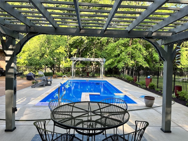 view of pool with a patio, fence, a fenced in pool, a pergola, and outdoor dining space