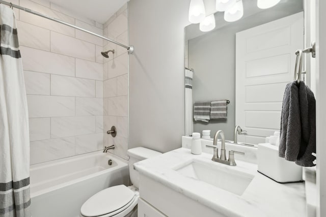 bathroom featuring vanity, shower / bath combination with curtain, and toilet