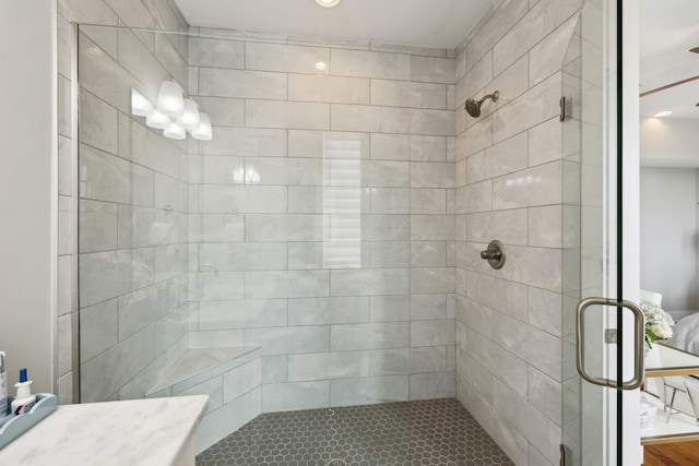 bathroom with a shower stall